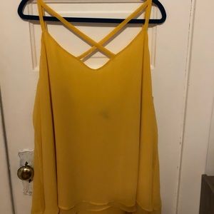 Beautiful yellow sheet top with cross cross detail